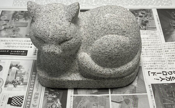A repeat US buyer purchased a stone sculpture of a cat.