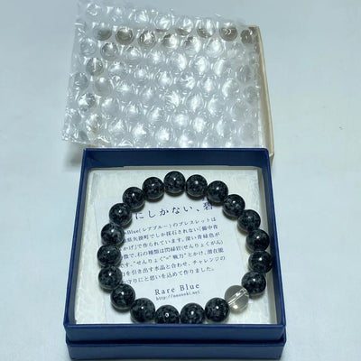 How We Packed and Shipped a Bichu Black Blue Diorite Juzu Bracelet from Japan to the United States by DHL