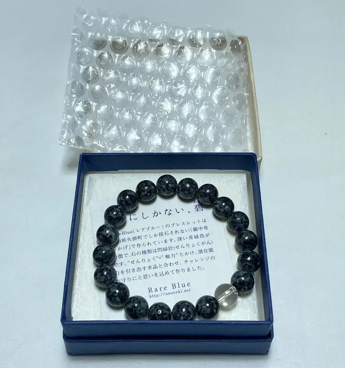 How We Packed and Shipped a Bichu Black Blue Diorite Juzu Bracelet from Japan to the United States by DHL - Japanstones.shop