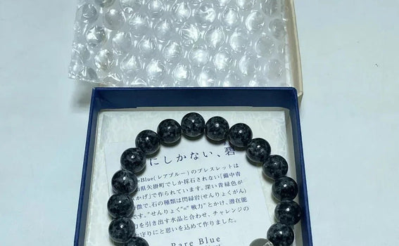 How We Packed and Shipped a Bichu Black Blue Diorite Juzu Bracelet from Japan to the United States by DHL