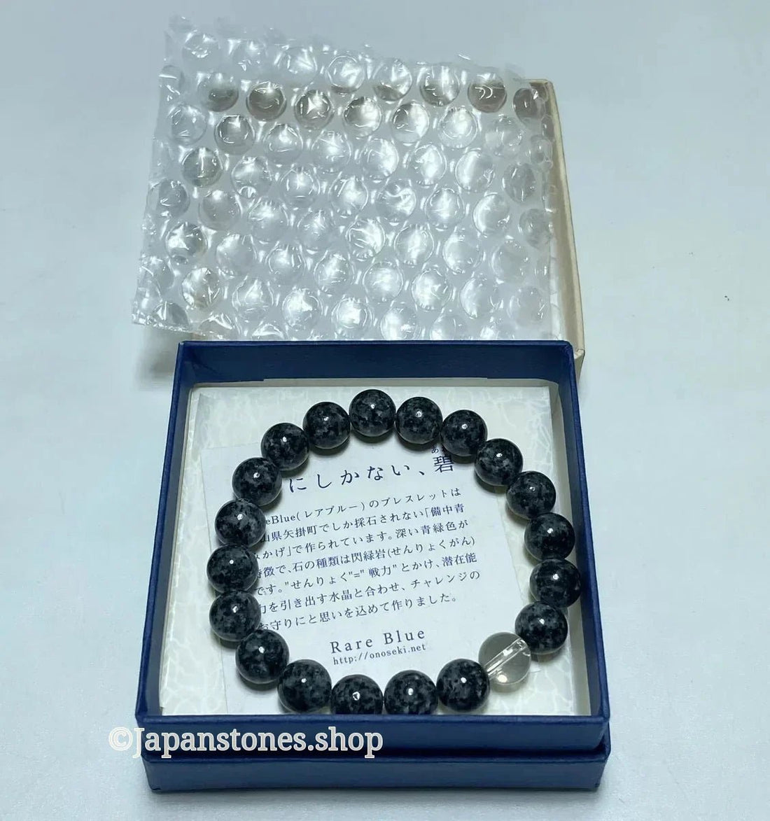 How We Packed and Shipped a Bichu Black Blue Diorite Juzu Bracelet from Japan to the United States by DHL - Japanstones.shop